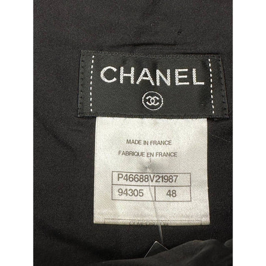CHANEL Black Bouclé Wool A-Line Skirt with CC Button - FR 48 Pre-owned