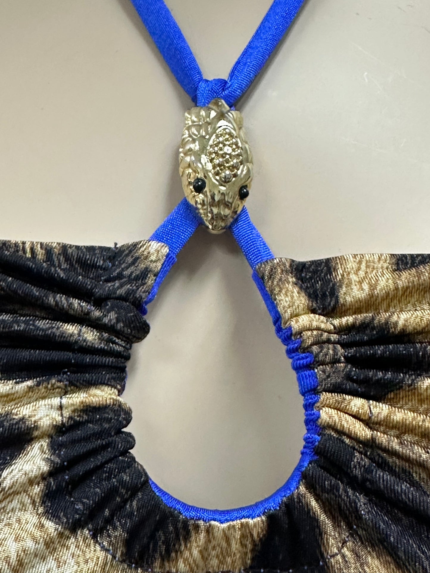 Swimsuit with animal print and strap decoration