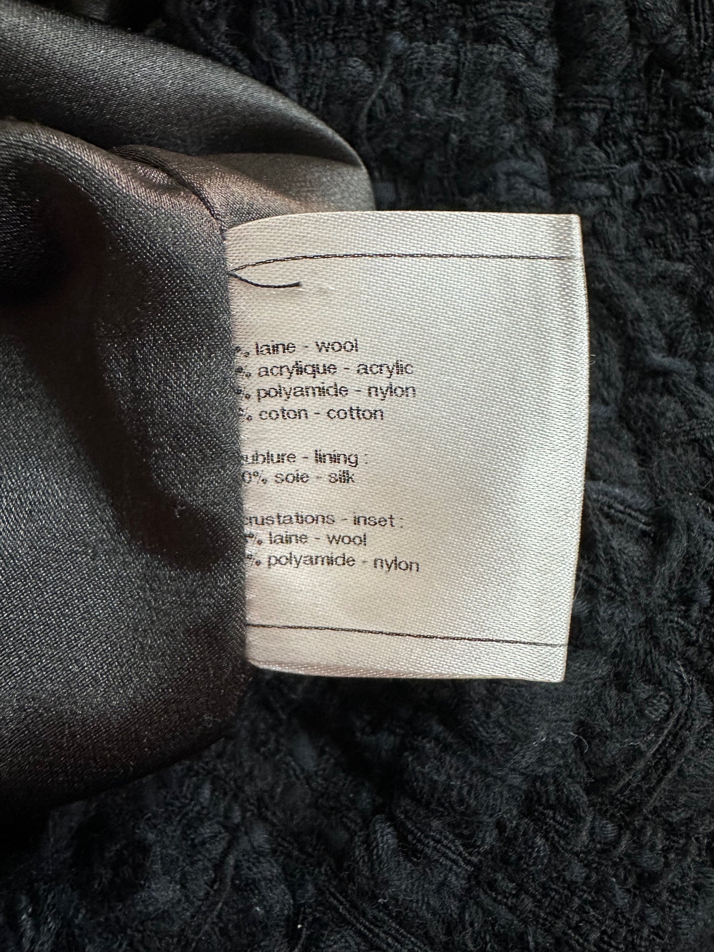 Tweed skirt with fringe and decorative hardware