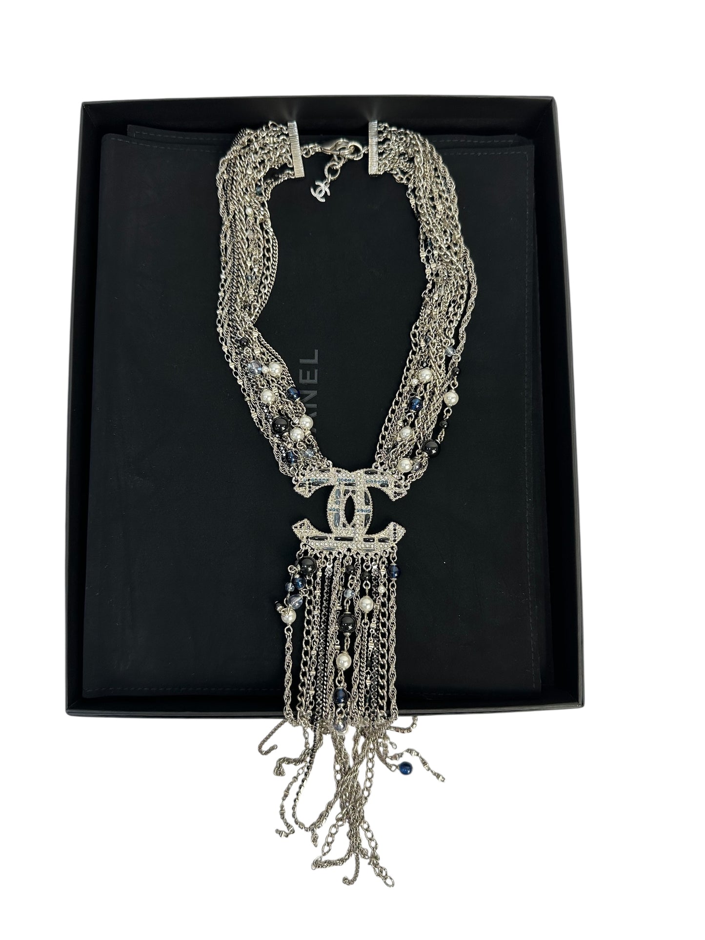Multi-layer necklace with pendants and chains