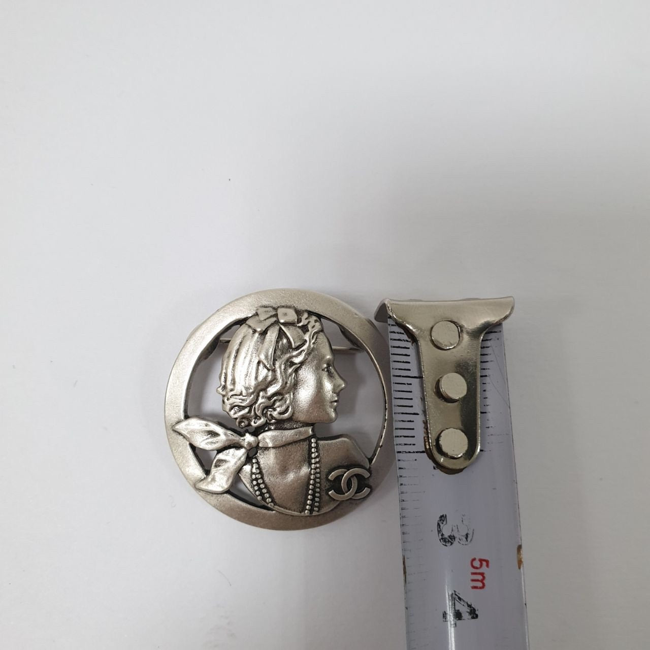 Chanel Silver-tone Mademoiselle Brooch Pre-owned