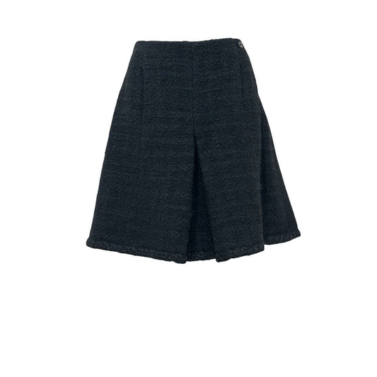CHANEL Black Bouclé Wool A-Line Skirt with CC Button - FR 48 Pre-owned