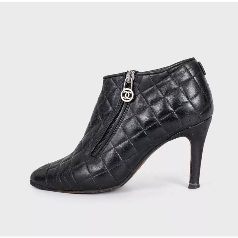 CHANEL Black Quilted Leather Zip Ankle Boots 37.5 Pre-owned