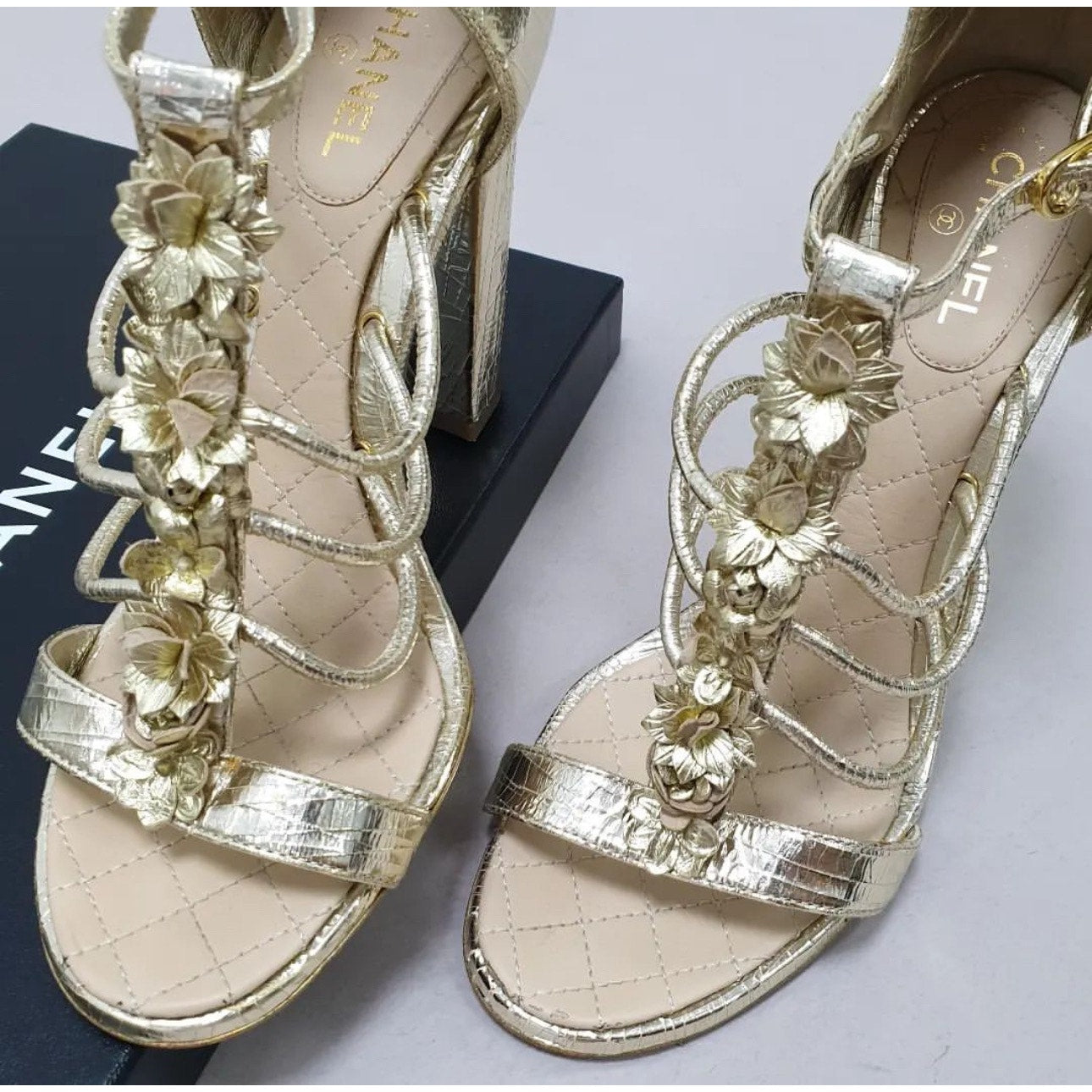 Chanel Gold Leather Camellia Ankle Strap Sandals - Size 40 pre-owned