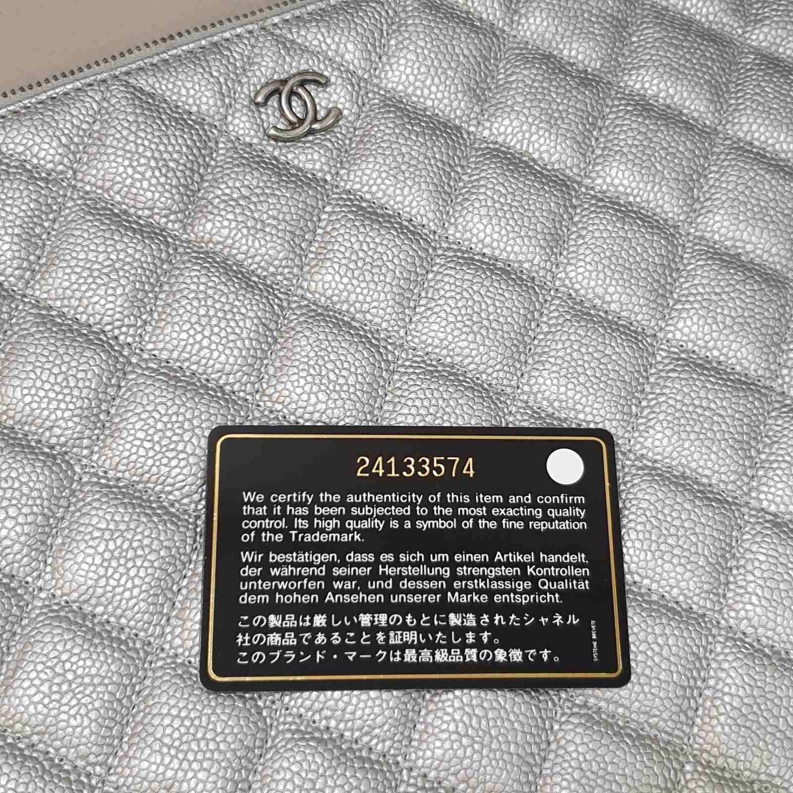 Chanel Silver Grain Leather Clutch Bag