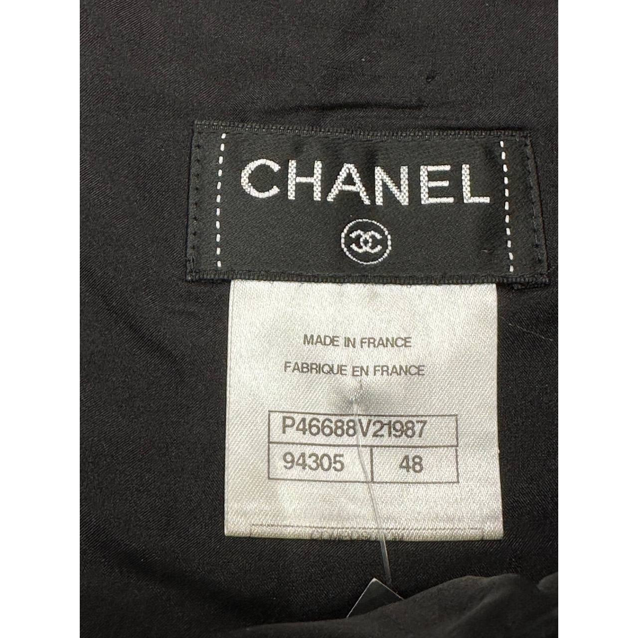 CHANEL Black Bouclé Wool A-Line Skirt with CC Button - FR 48 Pre-owned
