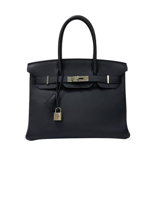 Birkin 30 two-tone — a wardrobe accent that draws attention