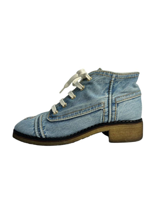 Denim boots with signature details