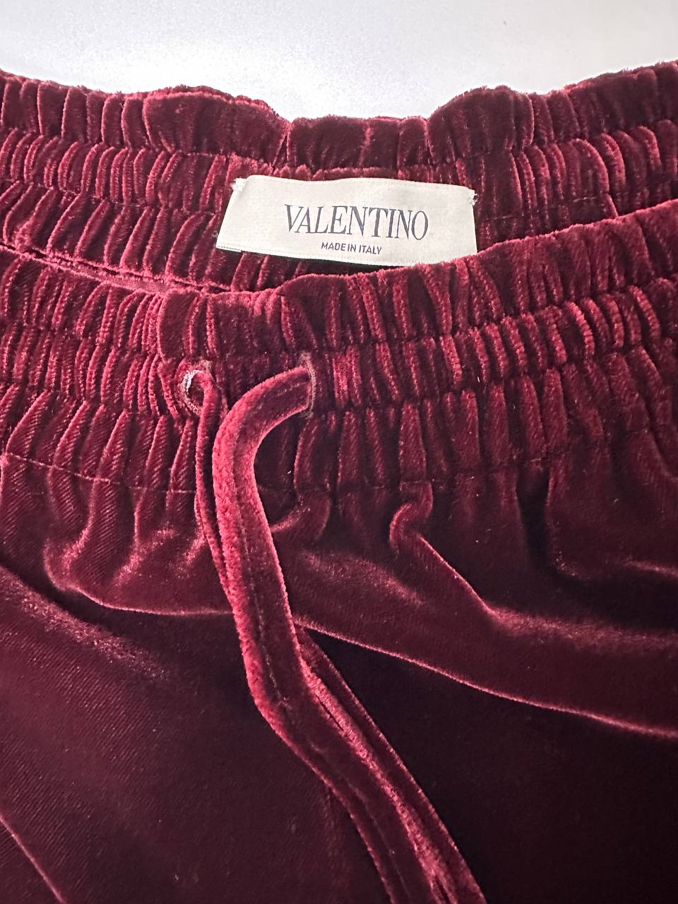 Burgundy velvet suit with white piping