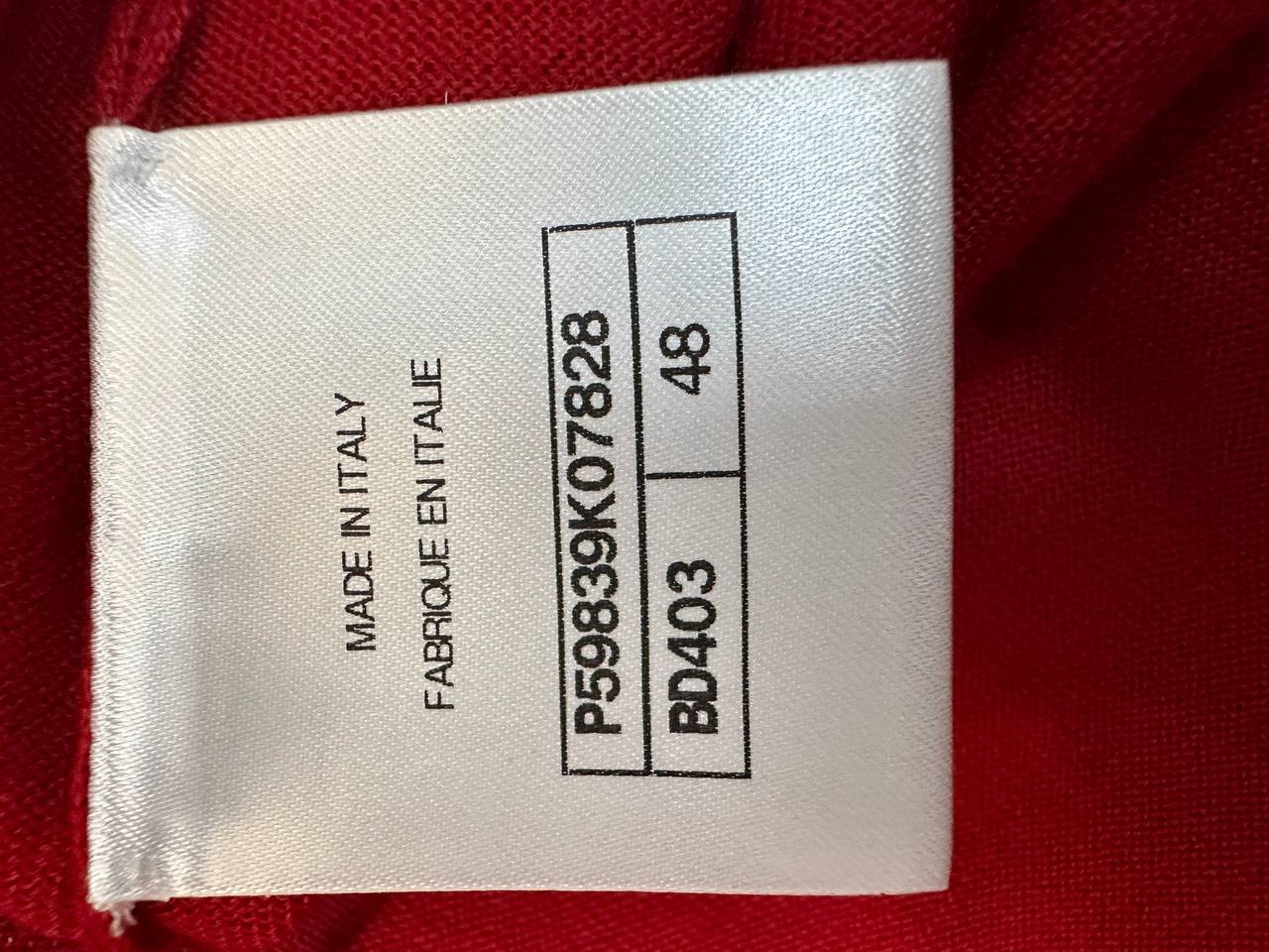 Cashmere pullover with brooch