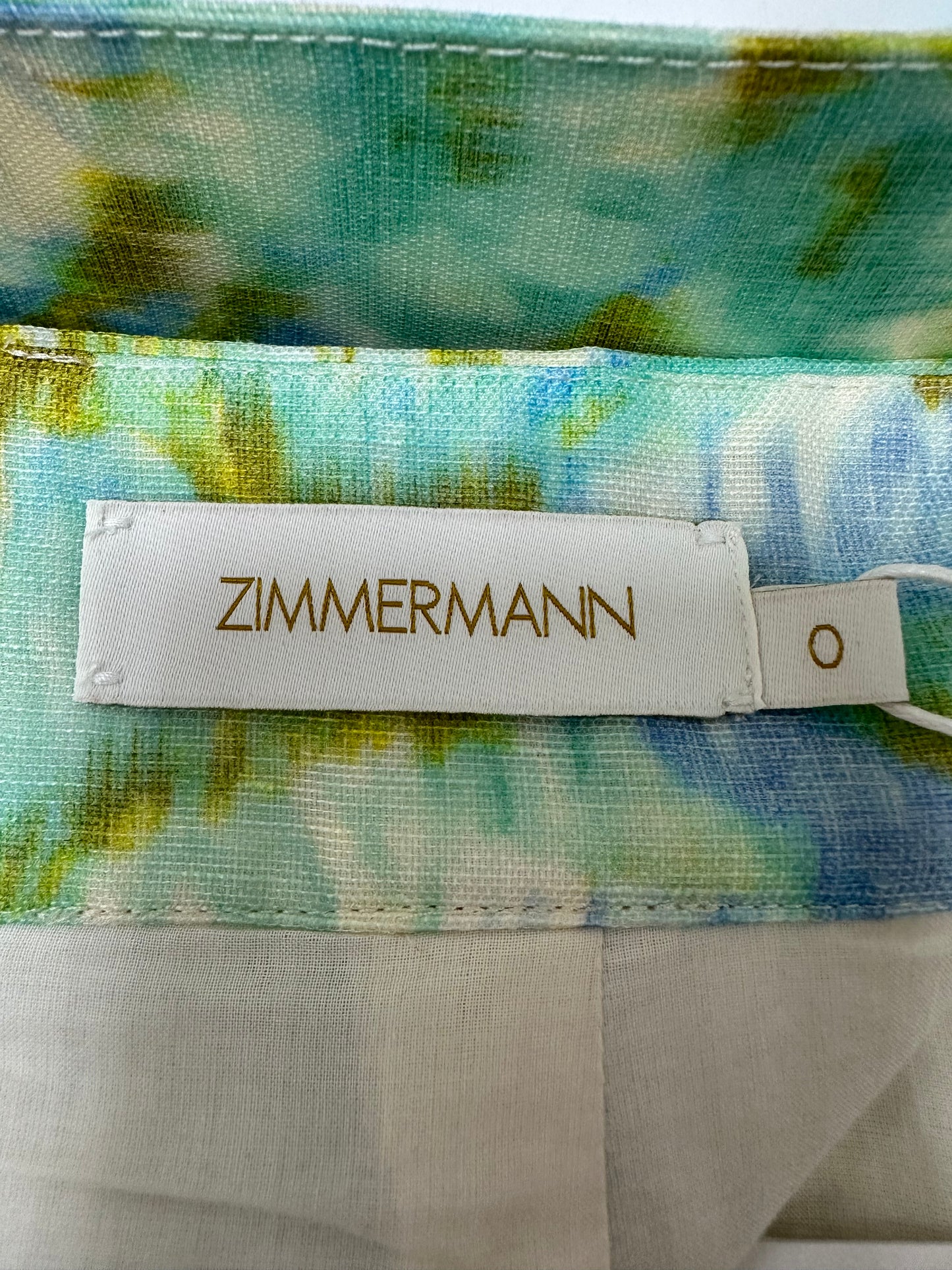 Draped top and belted shorts set