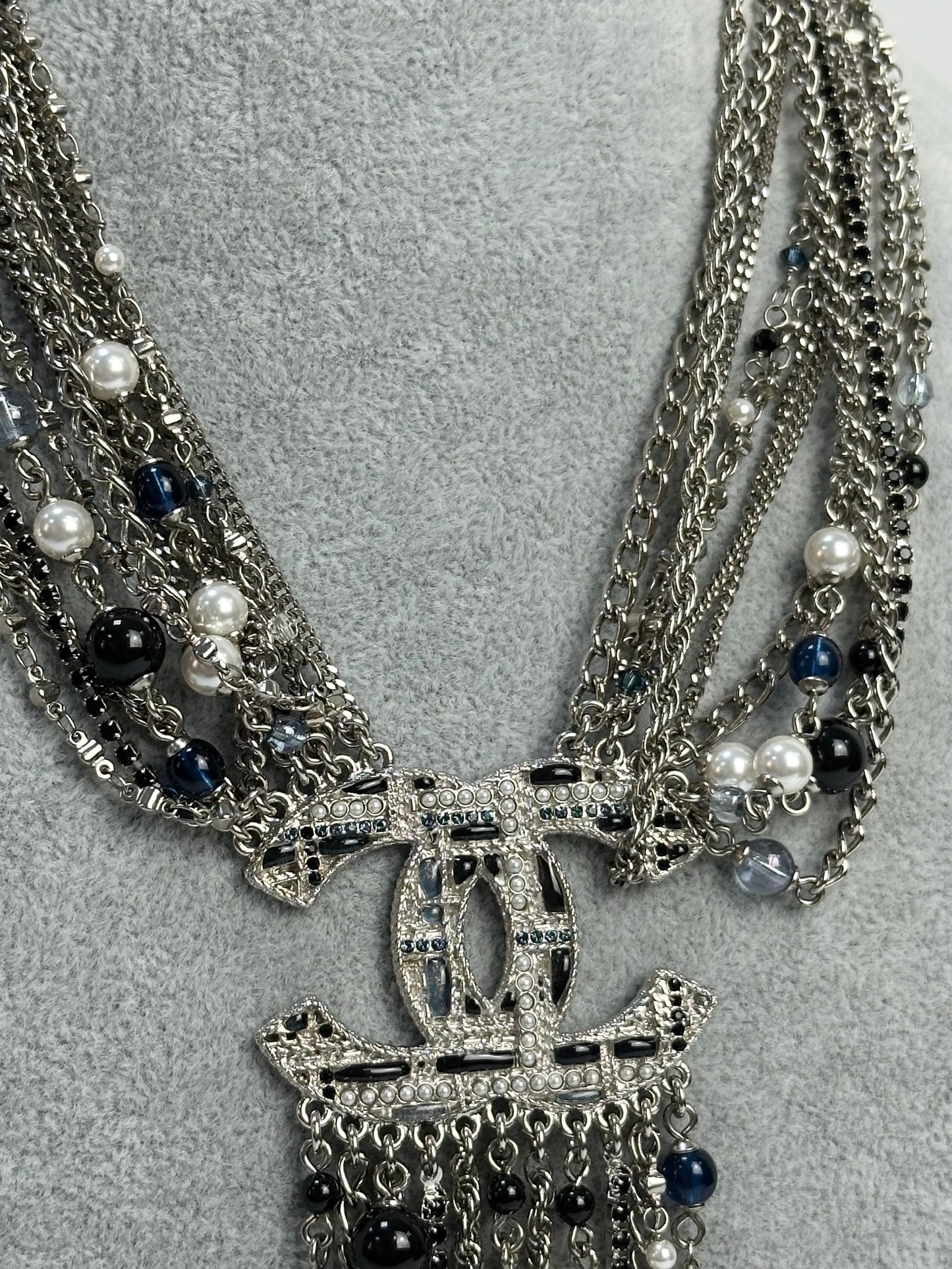 Multi-layer necklace with pendants and chains