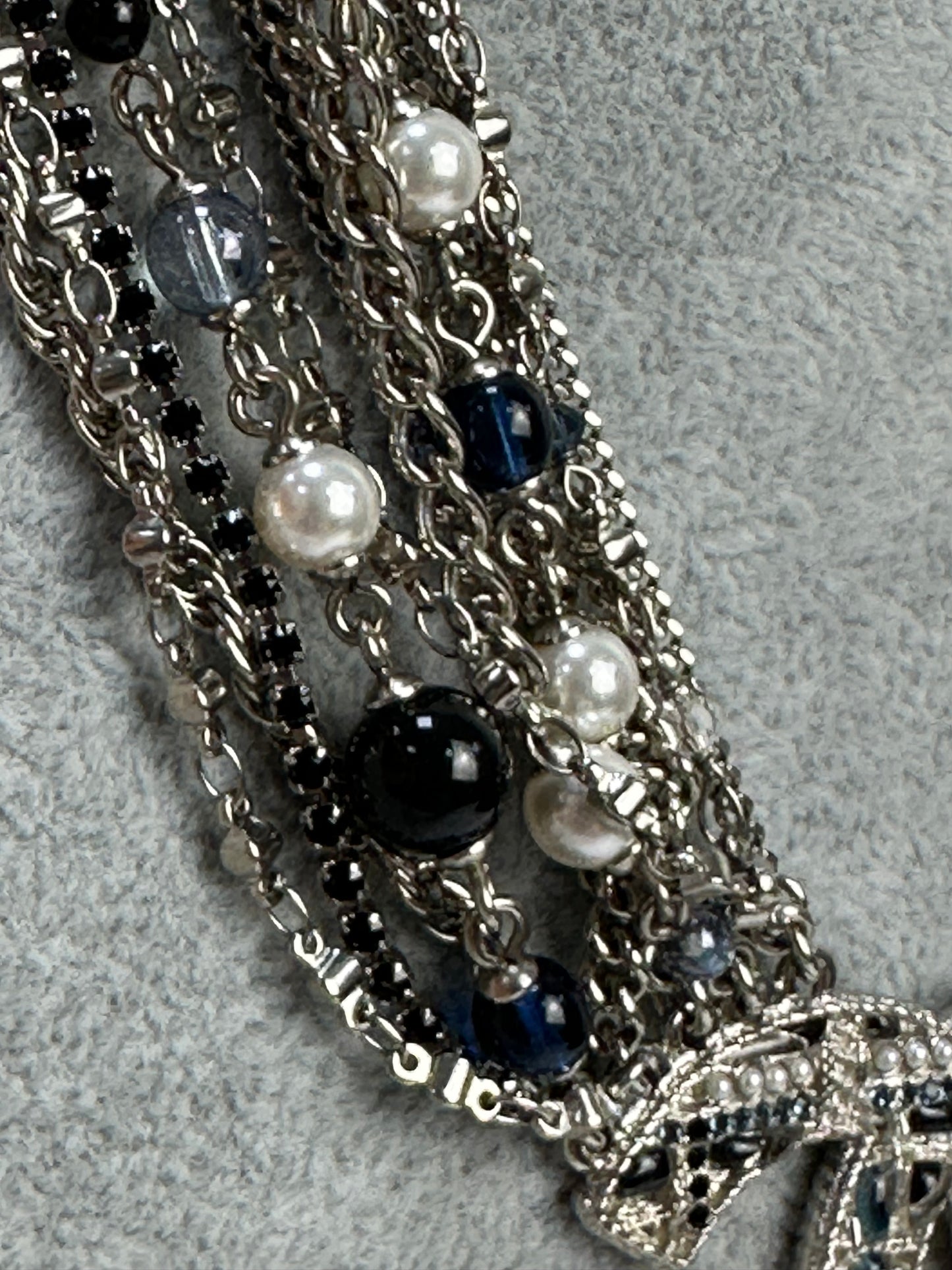 Multi-layer necklace with pendants and chains