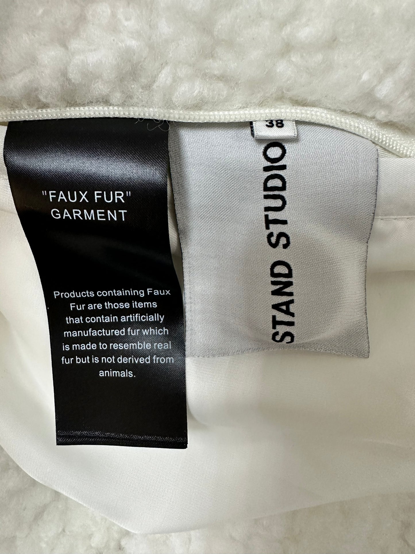 White long faux fur coat