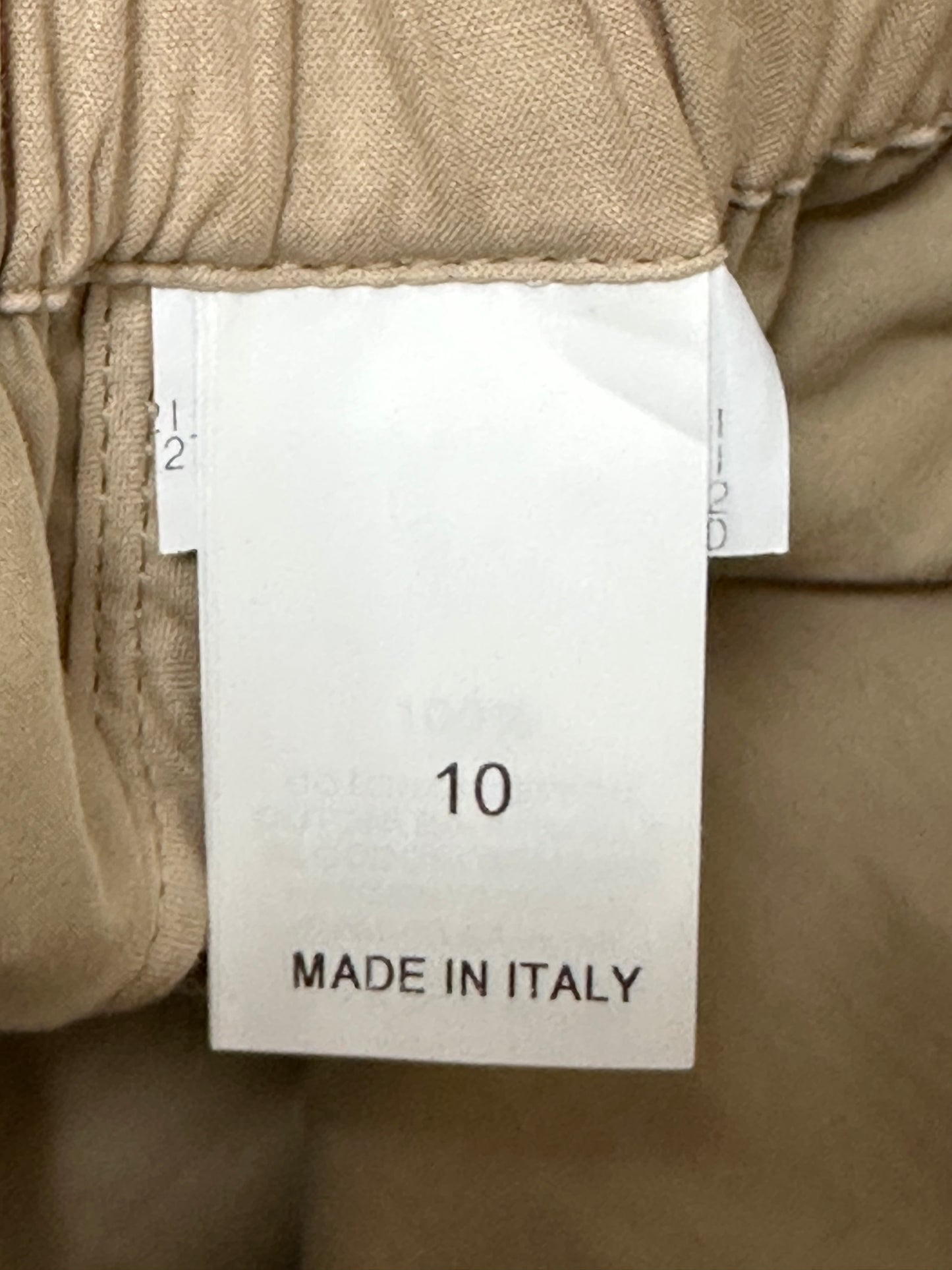 Loose fit cotton trousers in a versatile sand colour