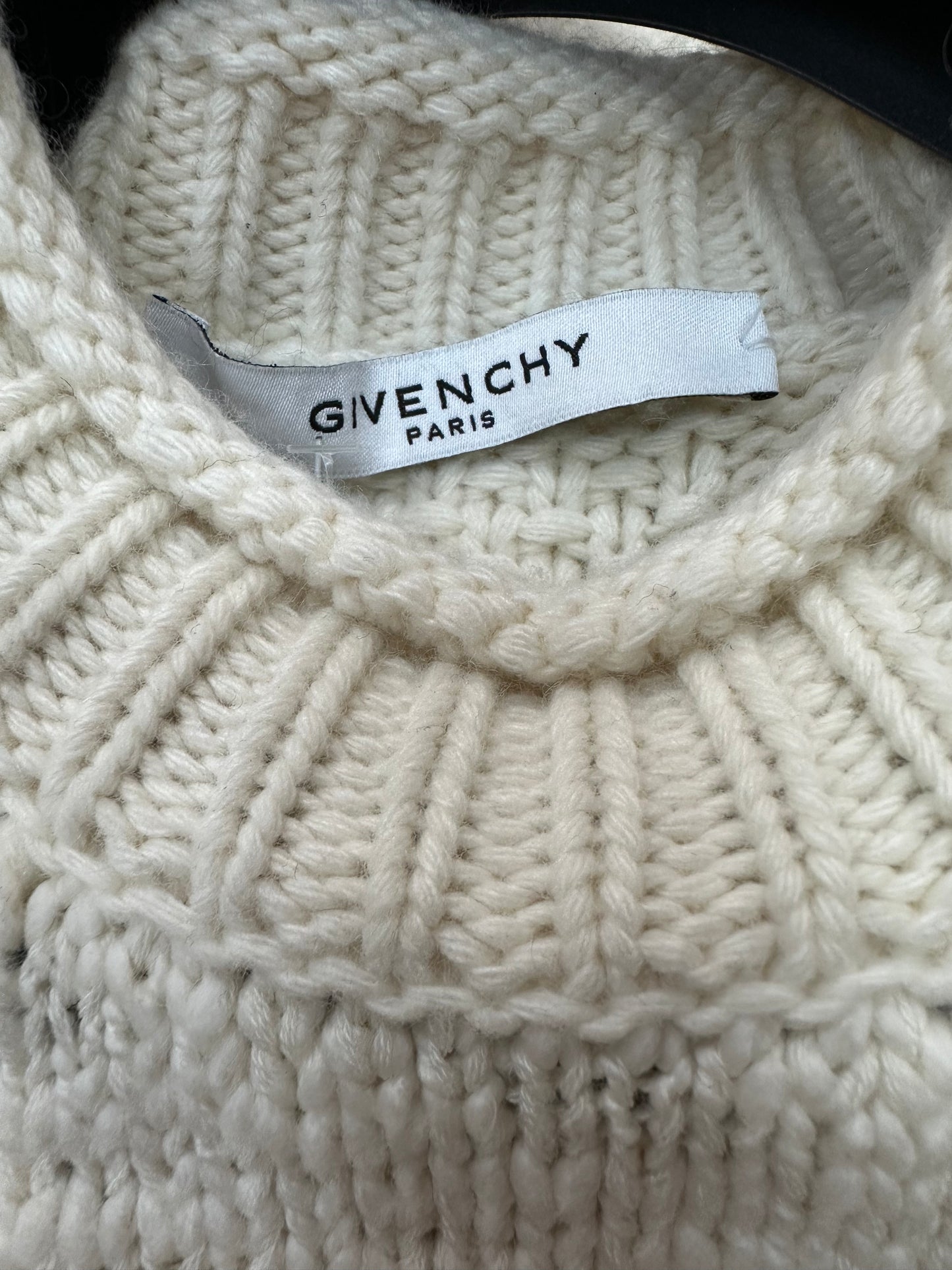 White knitted sweater with textured pattern