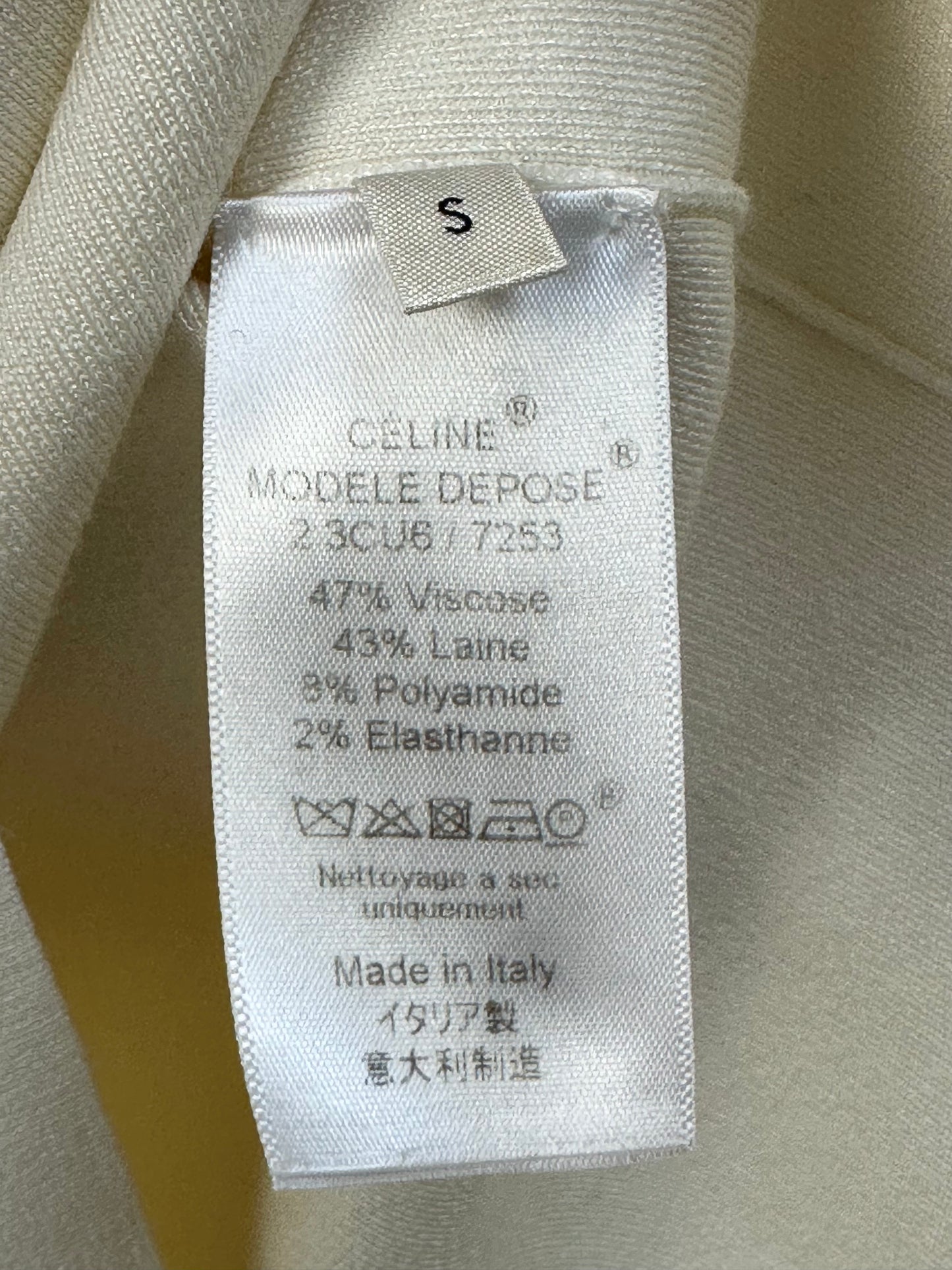 White wool top with long sleeves