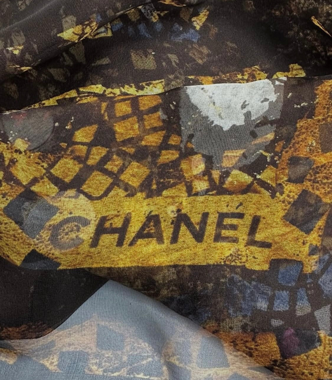 Silk scarf with abstract golden-brown pattern