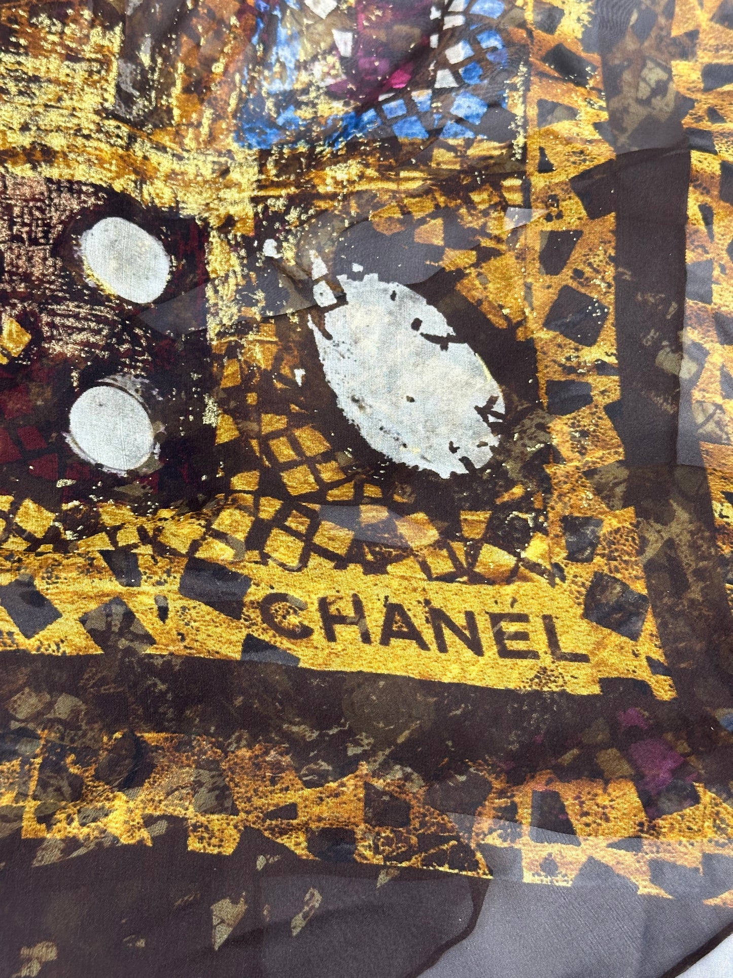 Silk scarf with abstract golden-brown pattern