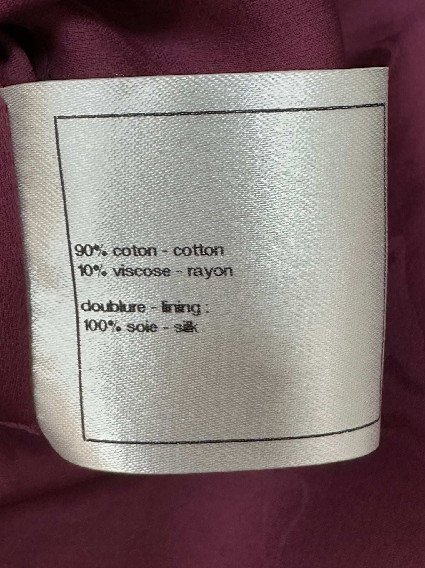 Long tweed coat with stand collar and decorative buttons