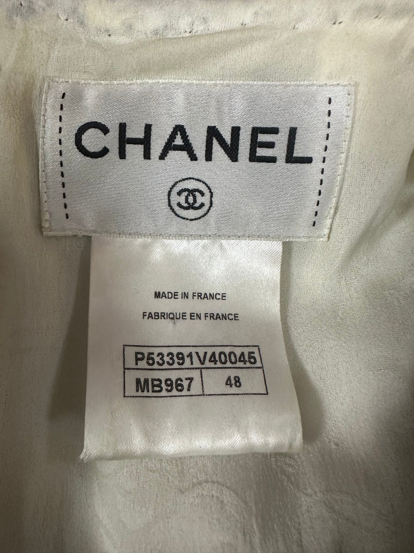 Tweed dress with short sleeves and patch pockets