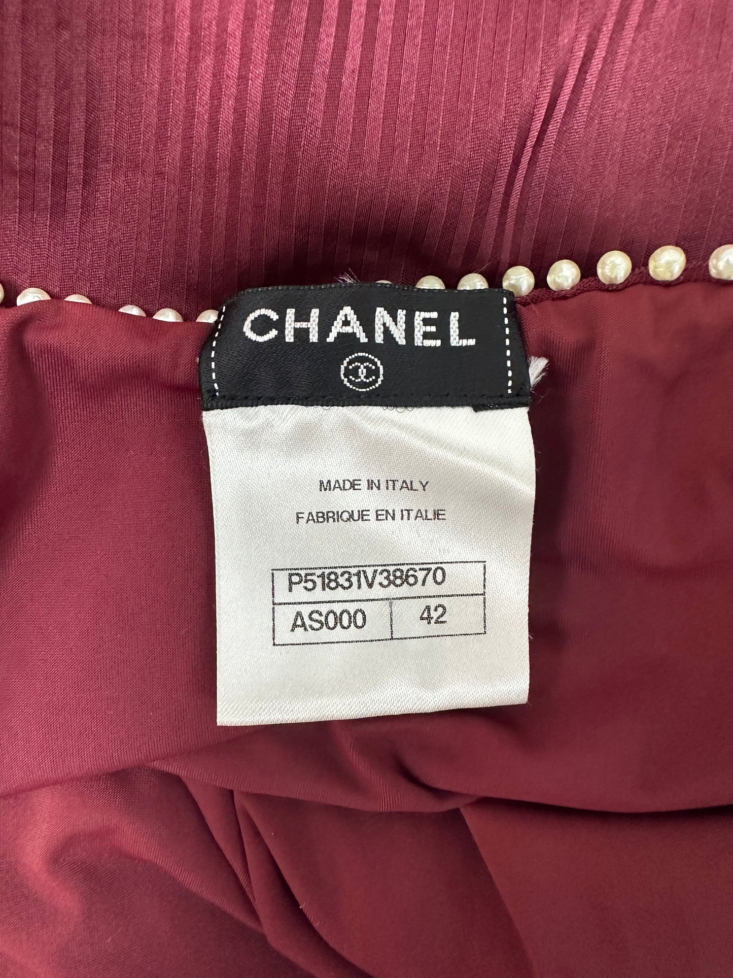 Burgundy swimsuit with pearls and draped neckline