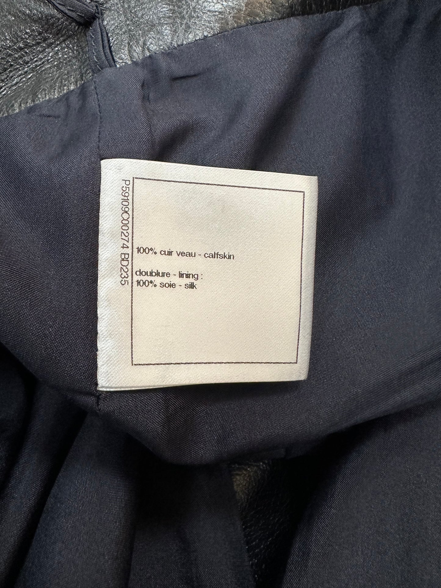 Leather skirt with decorative buttons