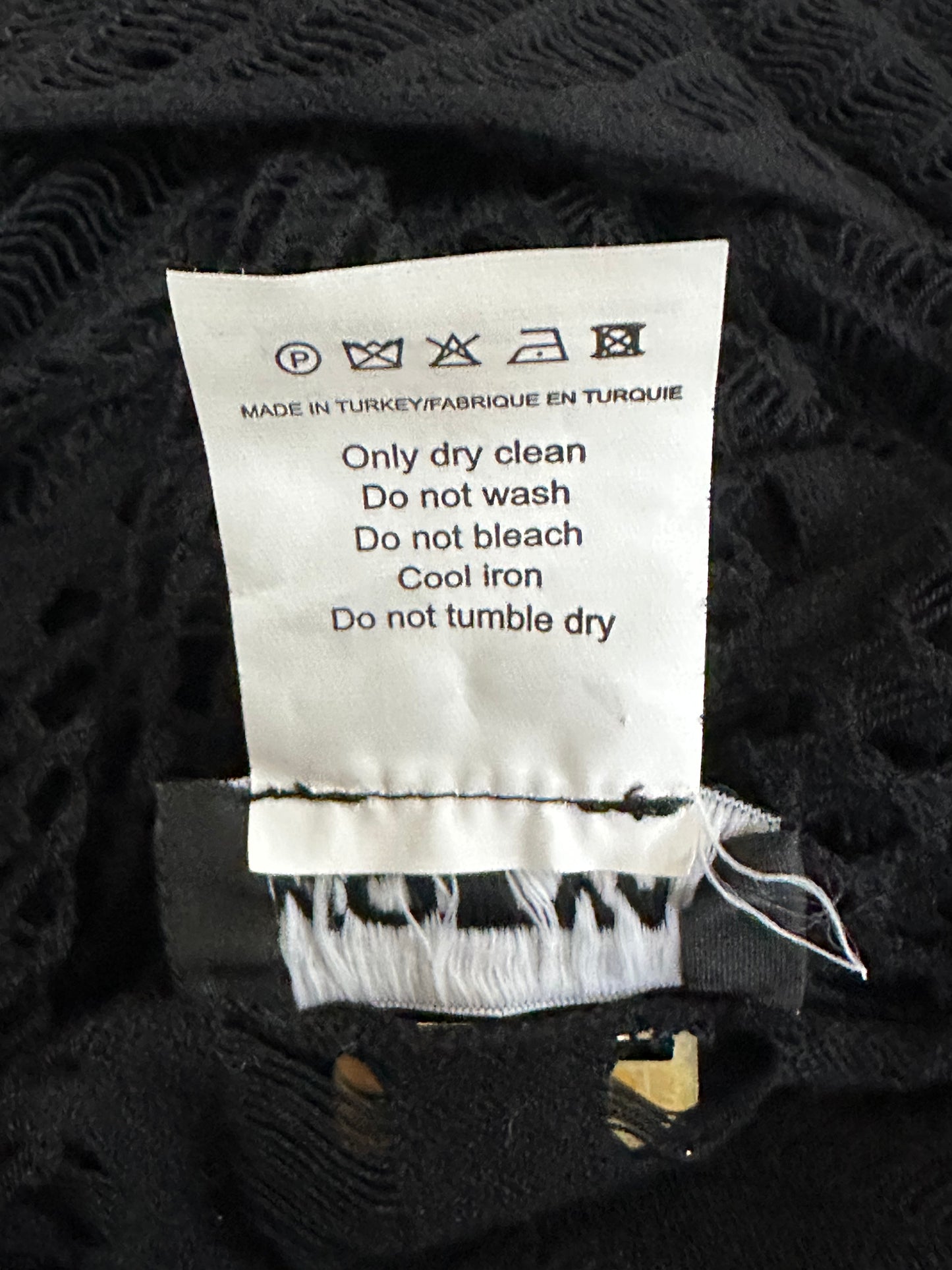 Dress with lace-knit design and sheer inserts