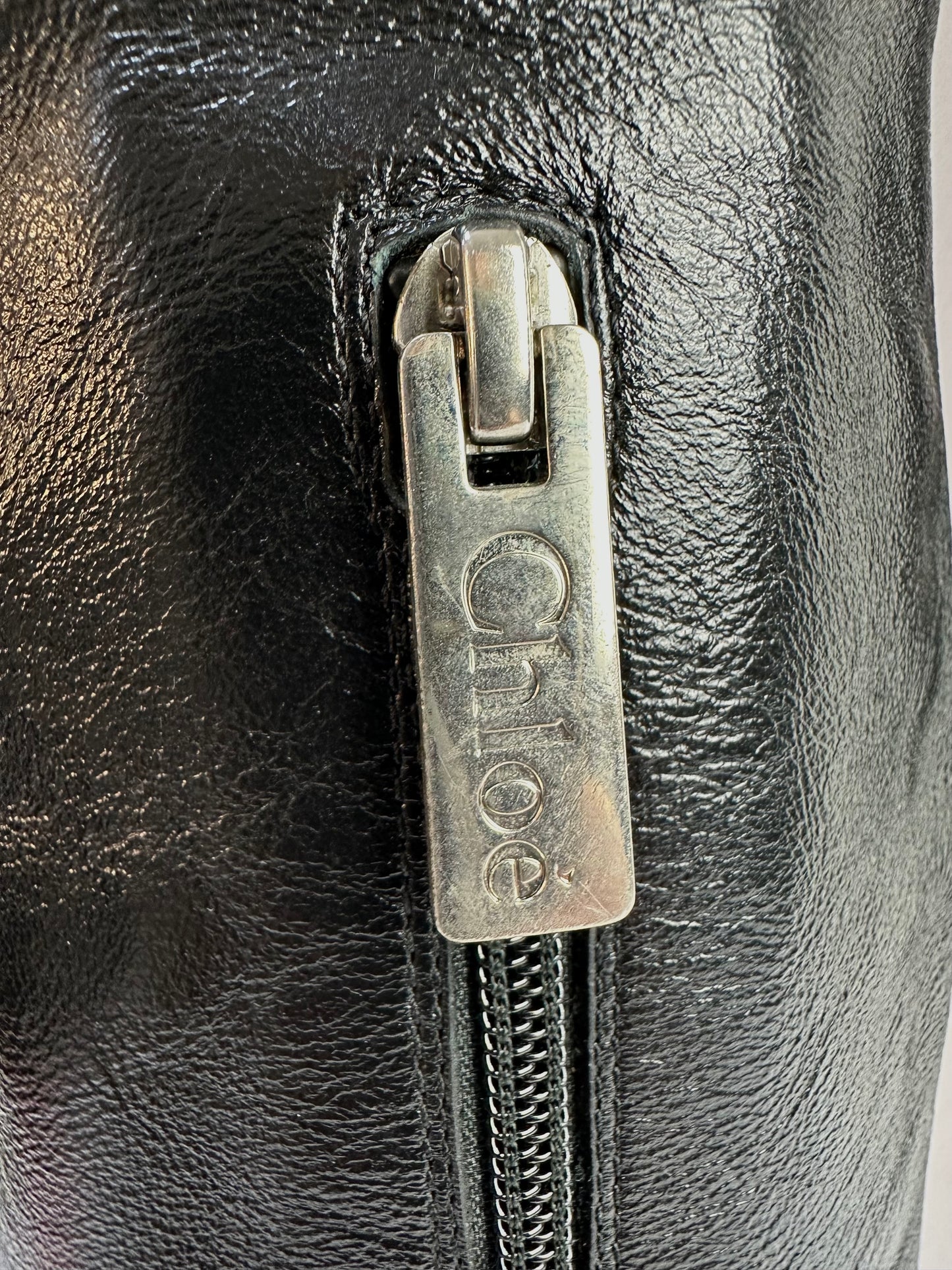 Leather over-the-knee boots with buckle and block heel