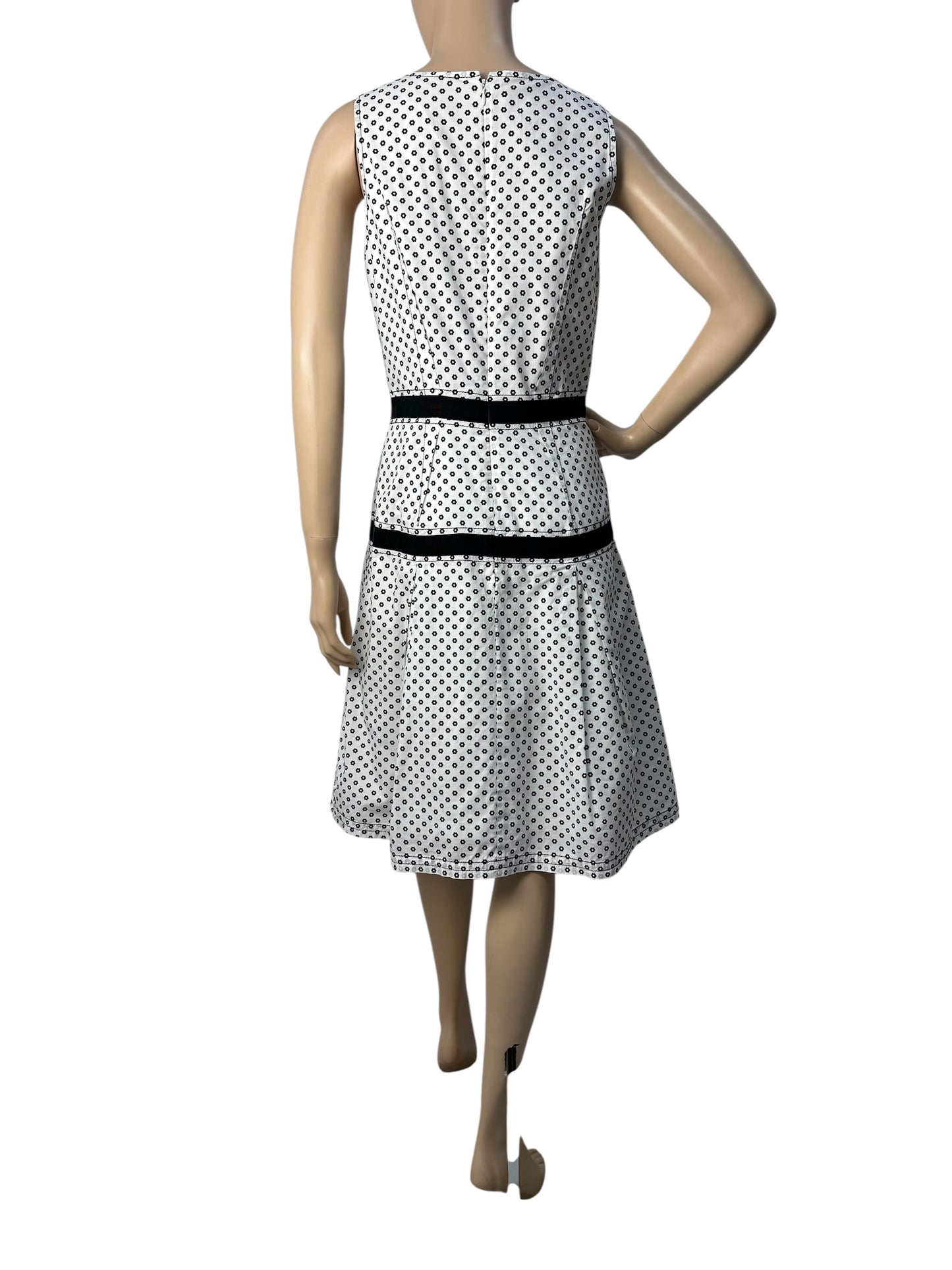 Polka dot dress with asymmetric hem
