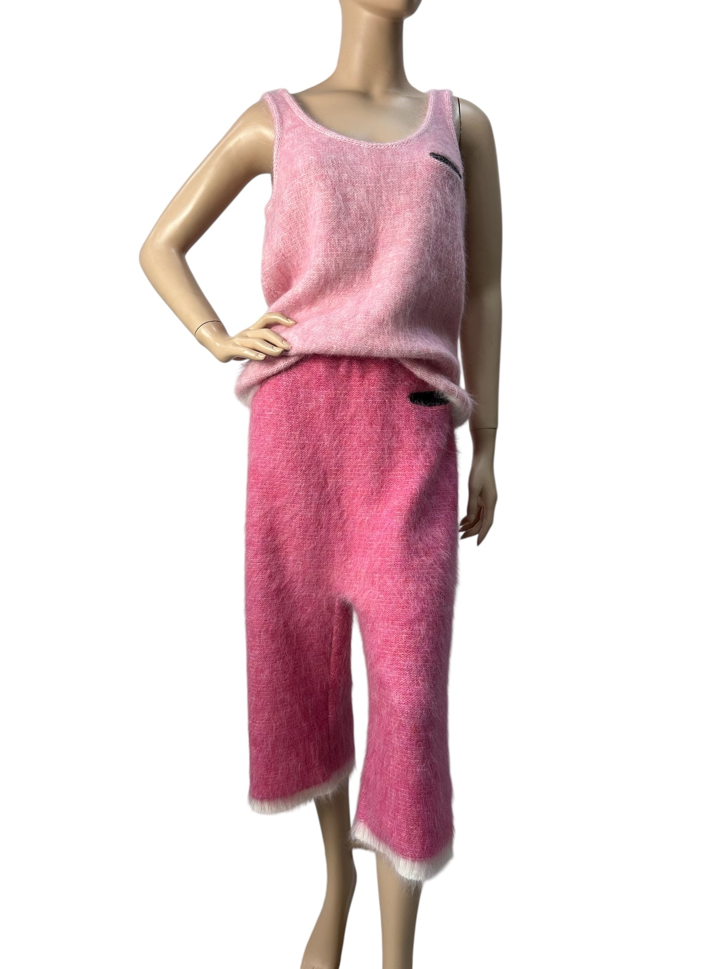 Pink knitted set with tank top and cropped pants