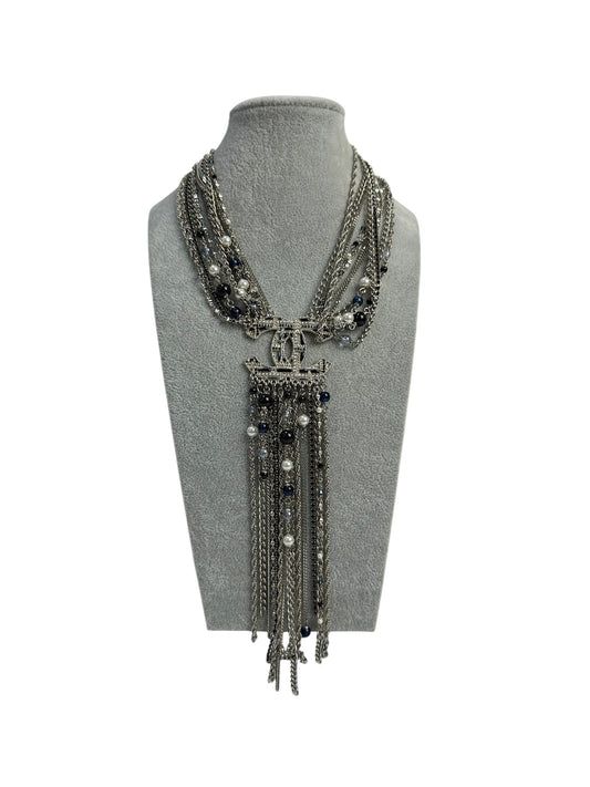 Multi-layer necklace with pendants and chains