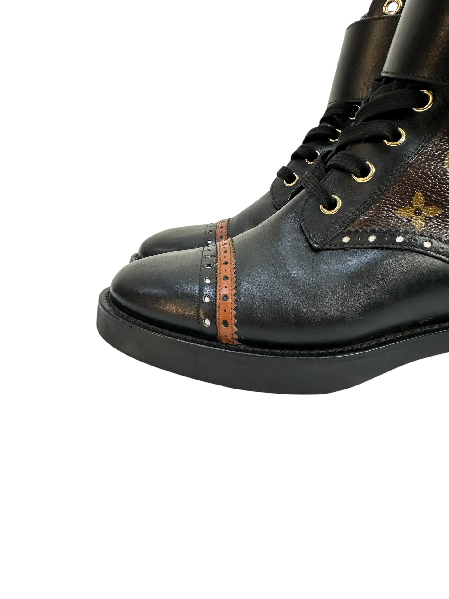 Ankle boots with leather inserts and metal detail