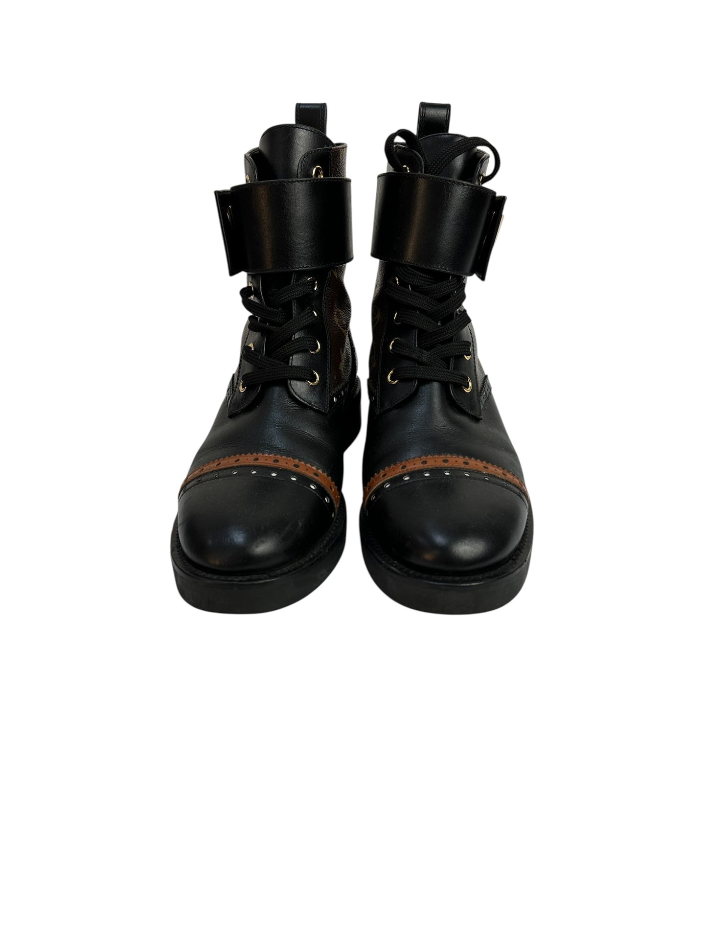 Ankle boots with leather inserts and metal detail