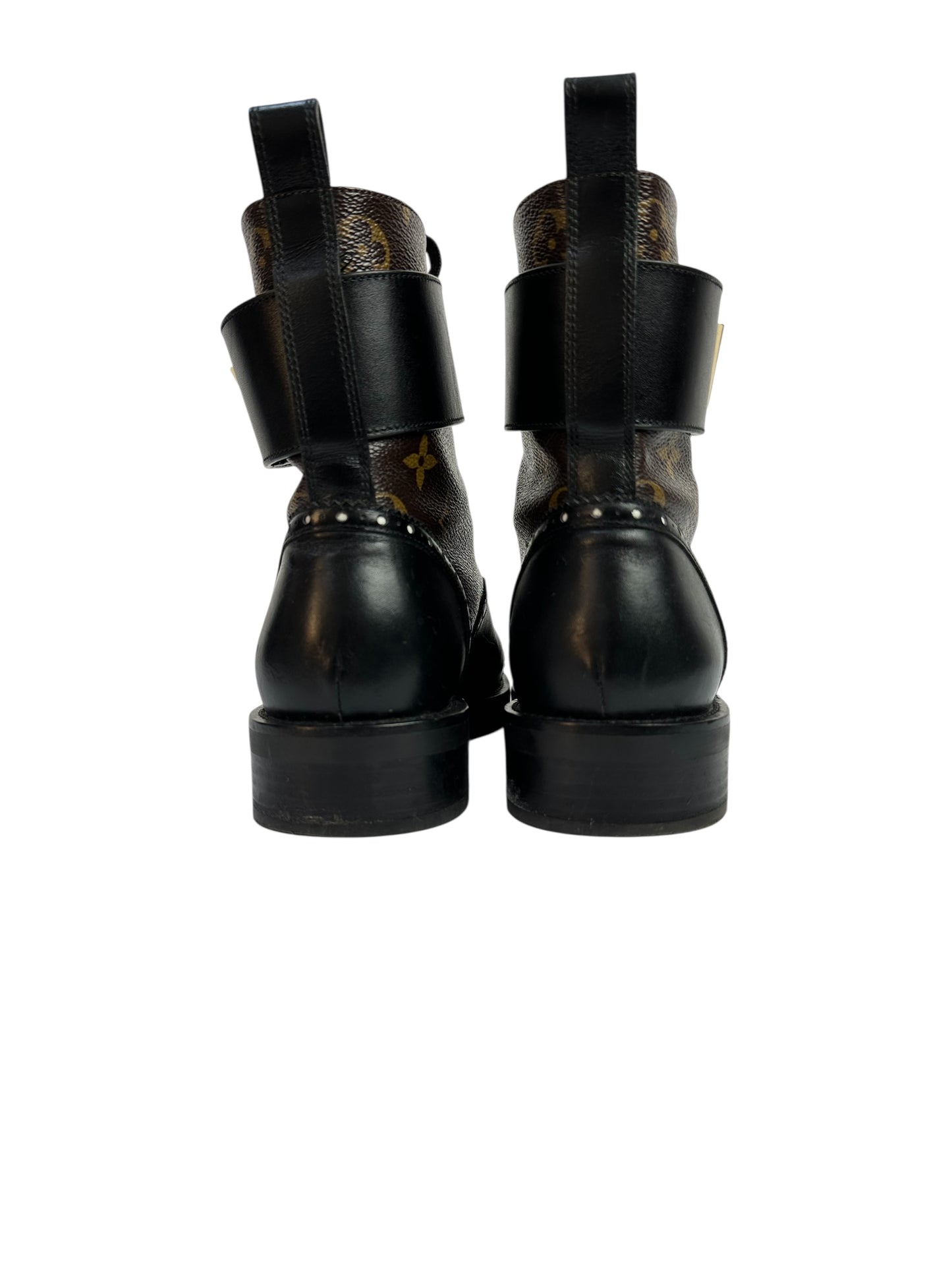Ankle boots with leather inserts and metal detail