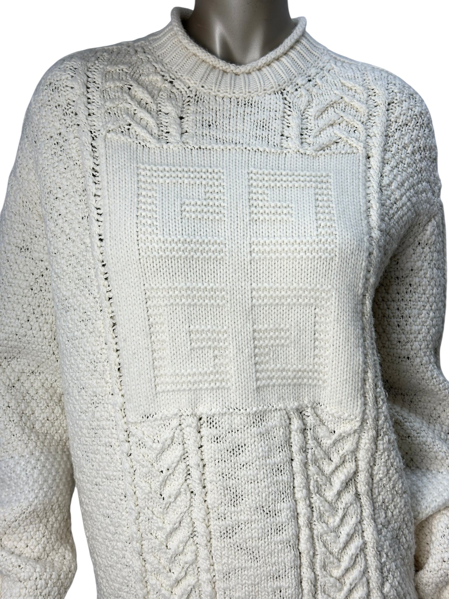 White knitted sweater with textured pattern