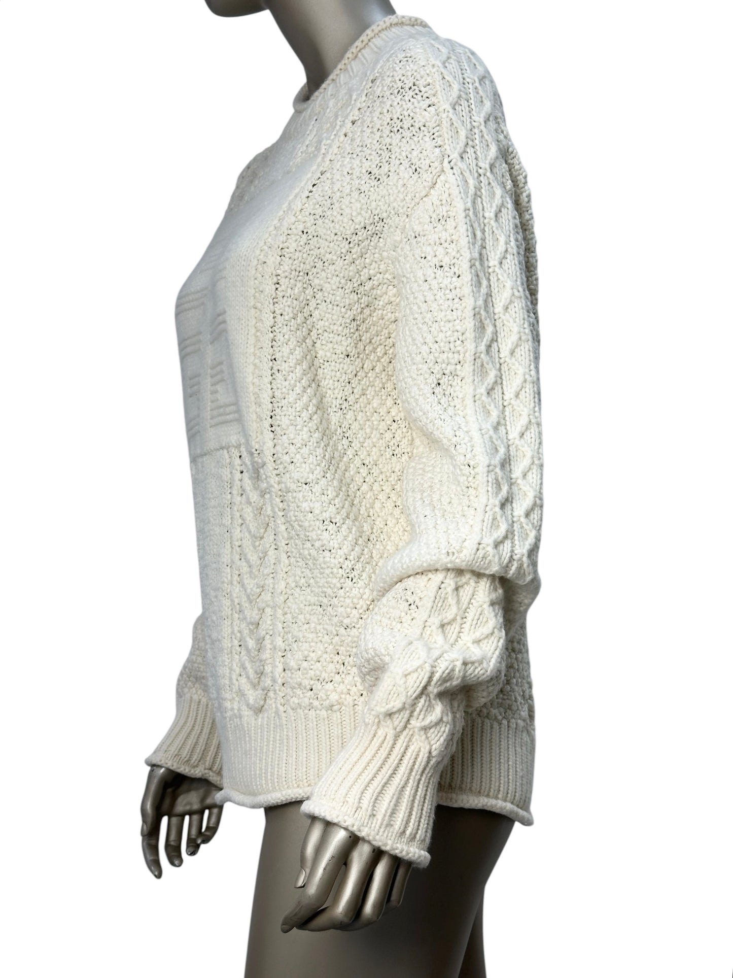 White knitted sweater with textured pattern