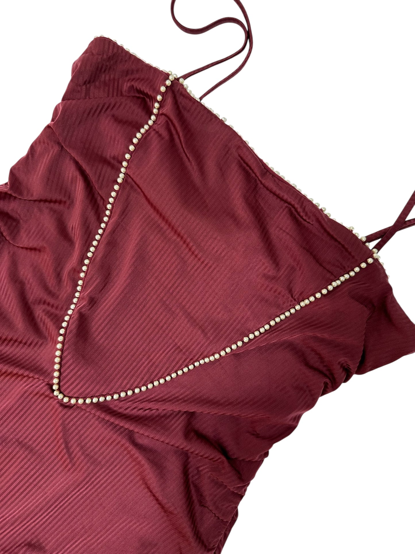 Burgundy swimsuit with pearls and draped neckline