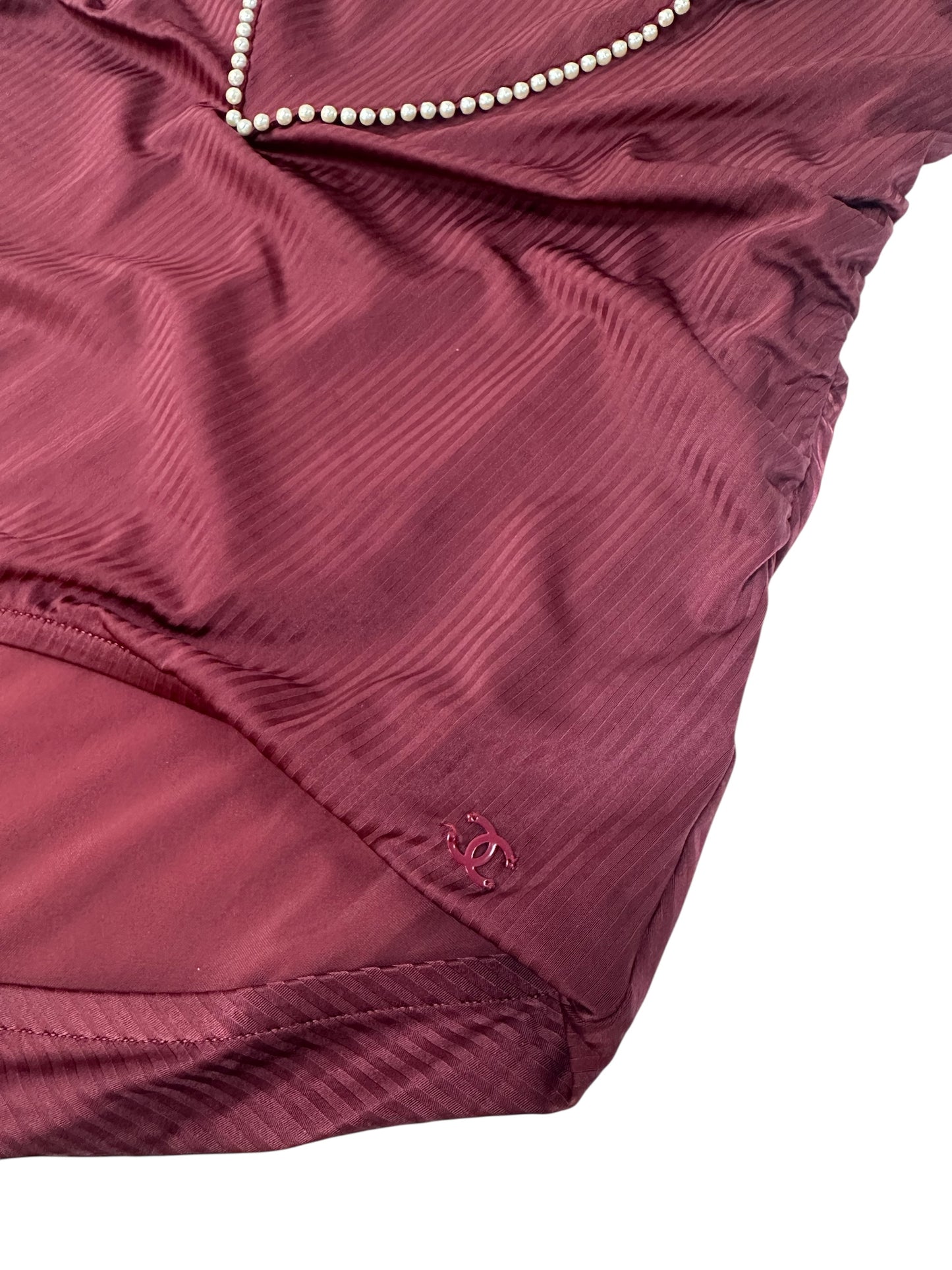 Burgundy swimsuit with pearls and draped neckline