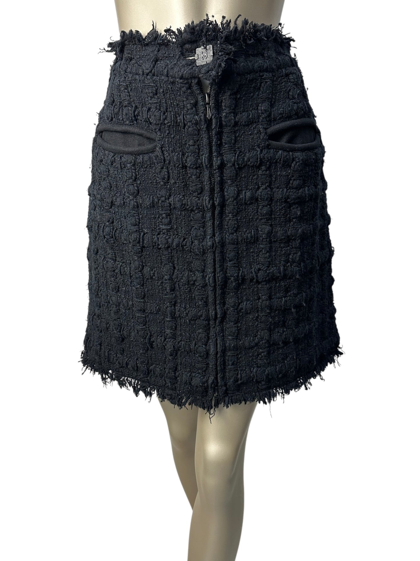 Tweed skirt with fringe and decorative hardware
