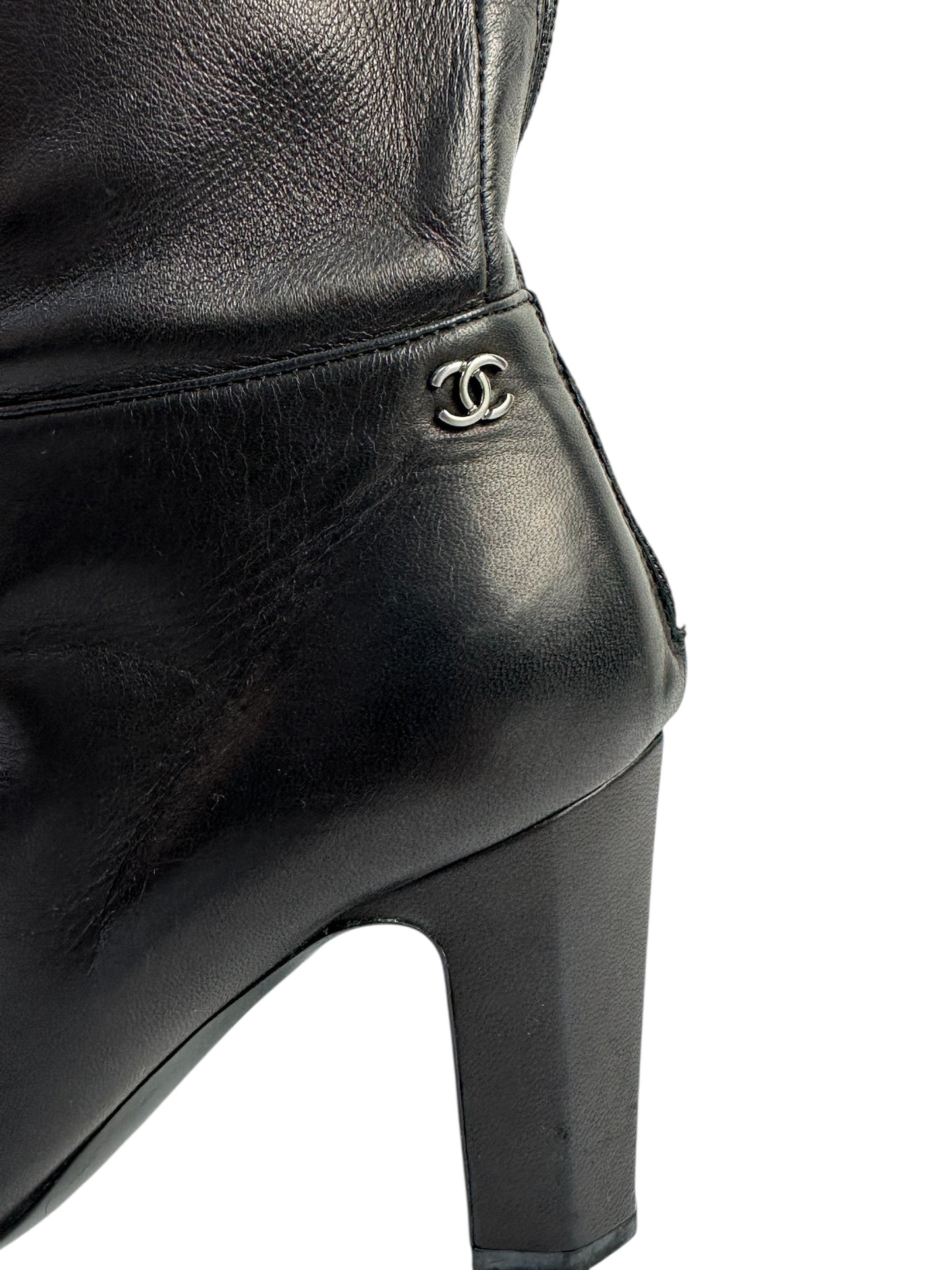 Leather knee-high boots with heel