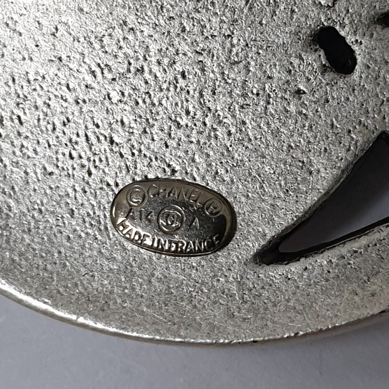 Chanel Silver-tone Mademoiselle Brooch Pre-owned