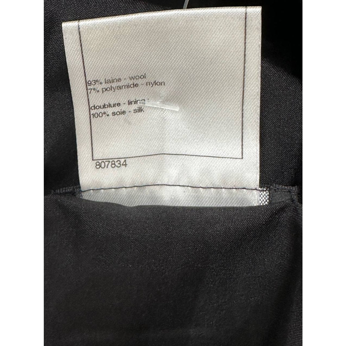 CHANEL Black Bouclé Wool A-Line Skirt with CC Button - FR 48 Pre-owned